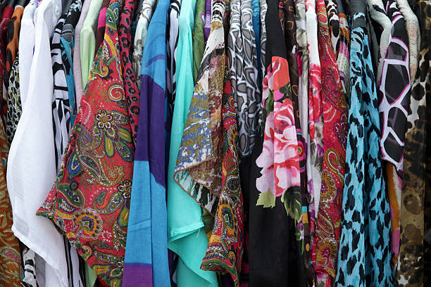 istock Row of blouses hanging in the wardrobe 519662056