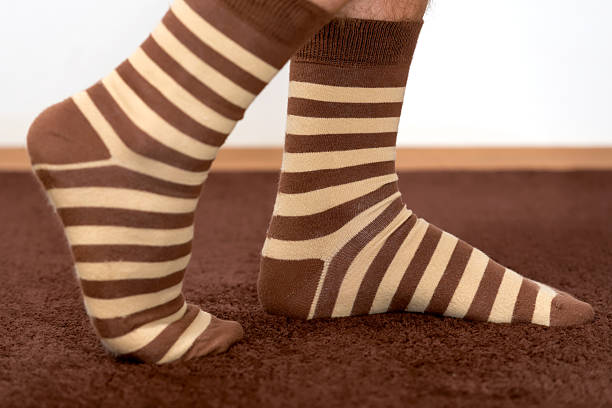 istock Male feet feeling comfortable at home. 519662124