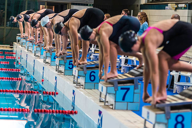 istock Female swimmer on starting block 519662950