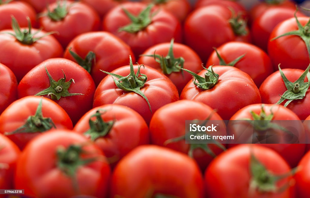 Pomodori sfondo - Foto stock royalty-free di Pomodoro