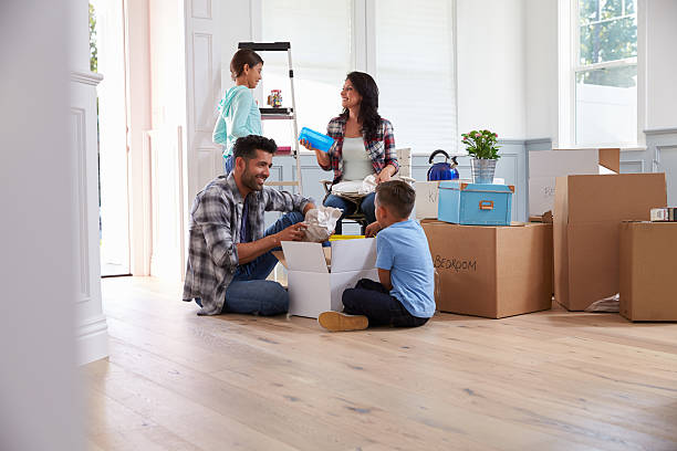 istock Hispanic Family Moving Into New Home 519663800