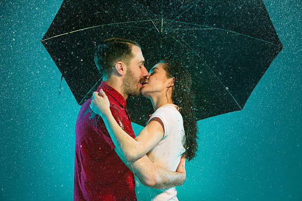 istock The loving couple in the rain 519664340