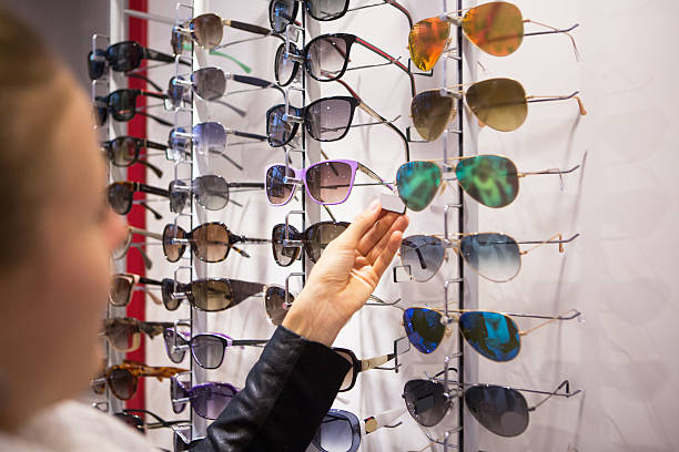istock Woman choosing sunglasses 519664575