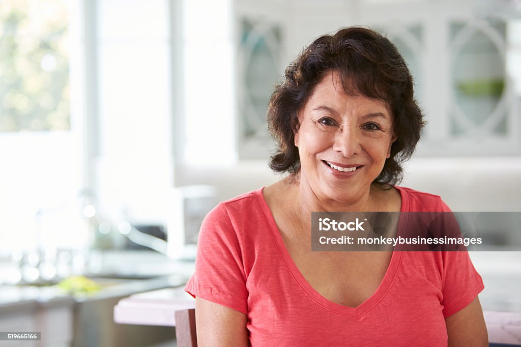 Head And Shoulders Portrait Of Senior Hispanic Woman At Home Senior Women Stock Photo