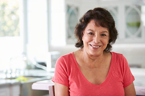 Head And Shoulders Portrait Of Senior Hispanic Woman At Home Head And Shoulders Portrait Of Senior Hispanic Woman At Home latin woman stock pictures, royalty-free photos & images