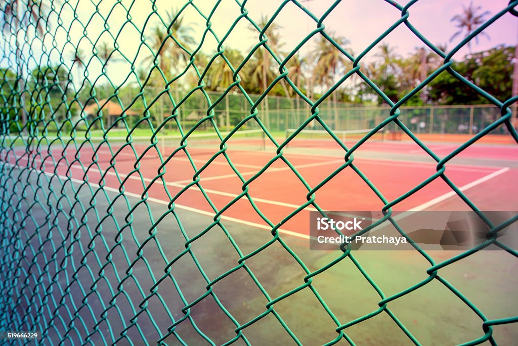 Green Net in front of Tennis Court Abstract Stock Photo