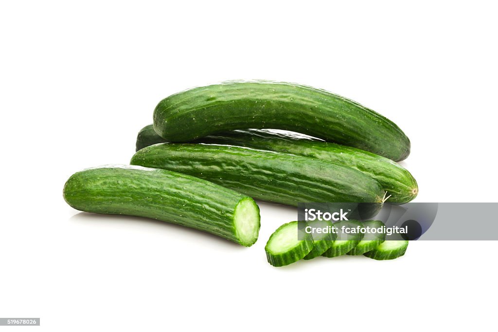 Cucumber Small group of organic cucumbers isolated on white background. DSRL studio photo taken with Canon EOS 5D Mk II and EF 100mm f/2.8L Macro IS USM Cucumber Stock Photo