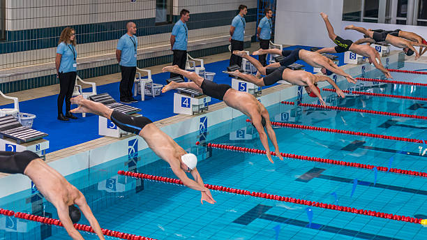 istock Male swimmer jumping 519678476