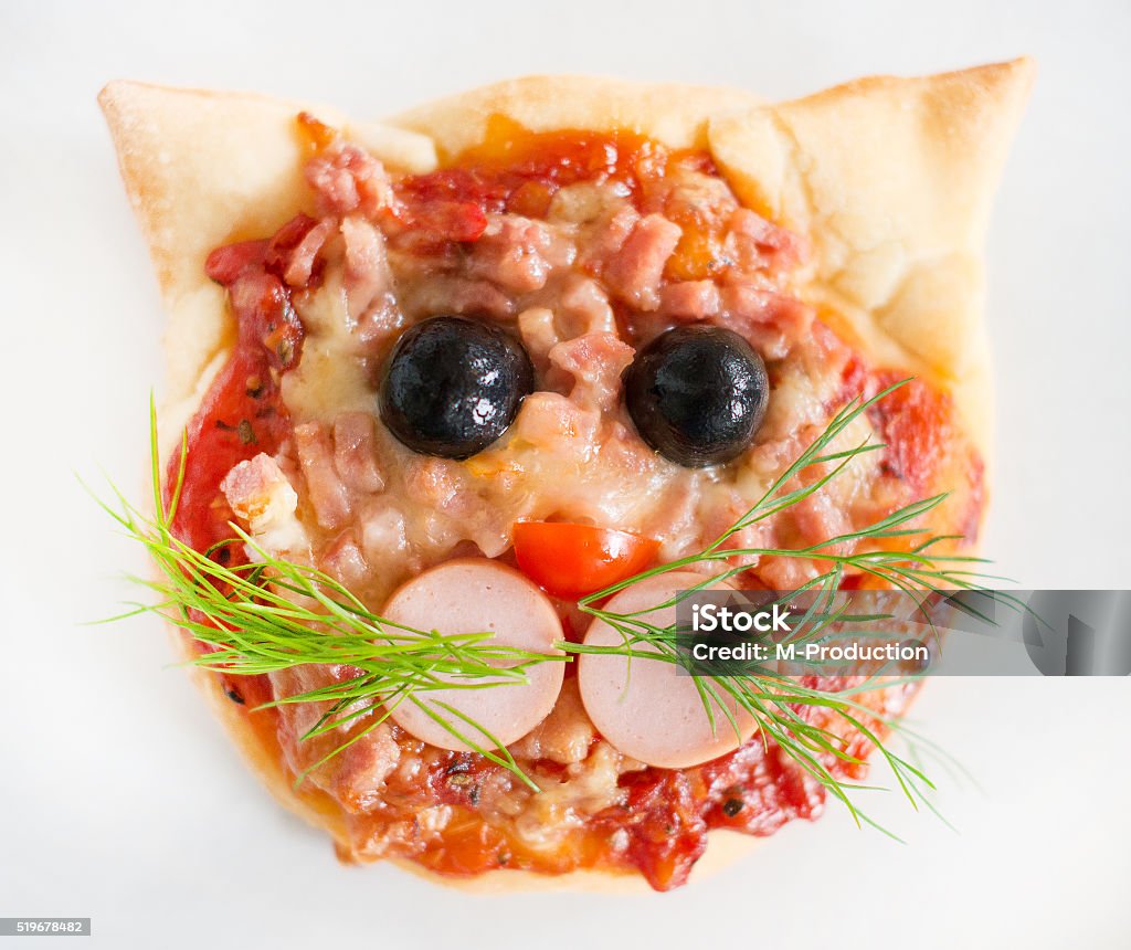 Handmade pizza in the form of cat. Animal Stock Photo