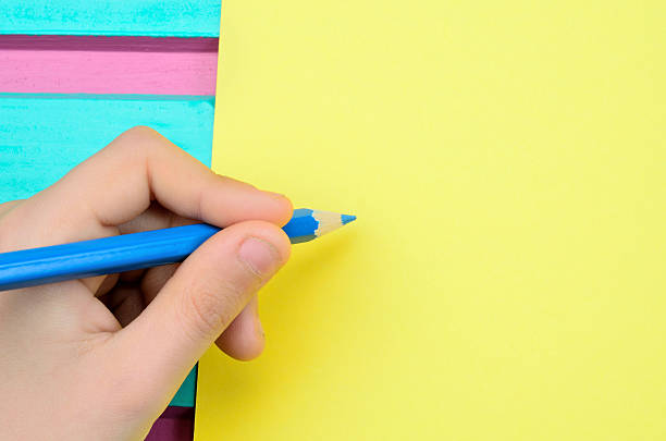 istock writing on yellow paper 519679386