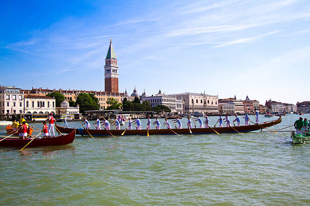 Venice, Italy: Festa della Sensa, Marriage to the Sea Festival Venice, Italy - May 17, 2015: Gondoliers participate in the Festa della Sensa, an annual spring festival celebrating the symbolic marriage of Venice to the Sea. Boats and gondolas parade and race from St. Mark's Basin to the Lido. grand canal china stock pictures, royalty-free photos & images