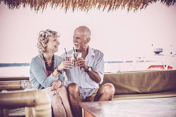 istock Cheerful Senior Couple Enjoying Summer Day on a Beach 519680494