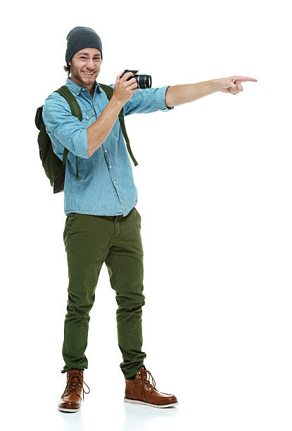 istock Smiling photographer pointing away 519681140