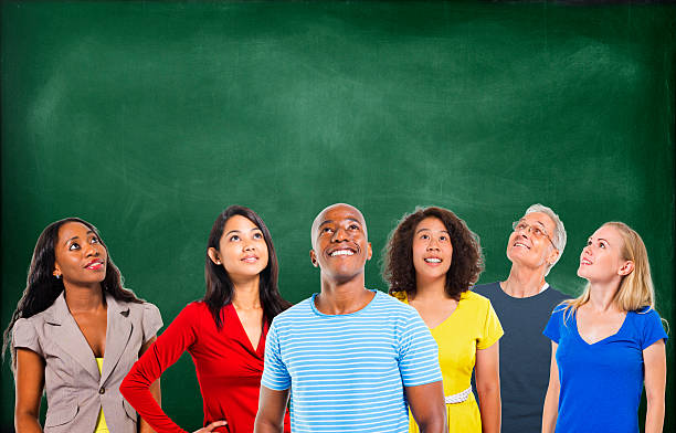 istock Diverse Happy People and Chalkboard Background 519681167