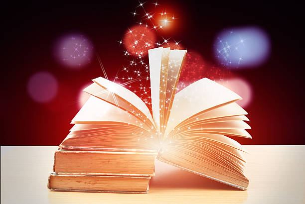 istock Abstract magic book on wooden background 519681178