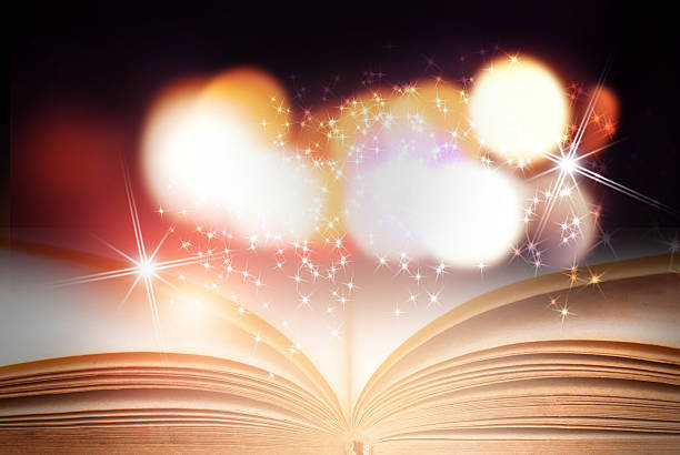 istock Abstract magic book on wooden background 519681292