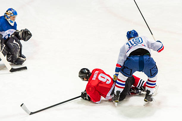 istock Men playing ice hockey 519681462