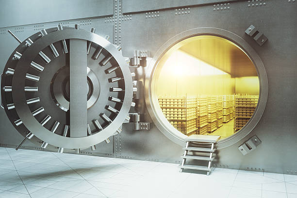 istock Bank vault with gold stacks 519681576