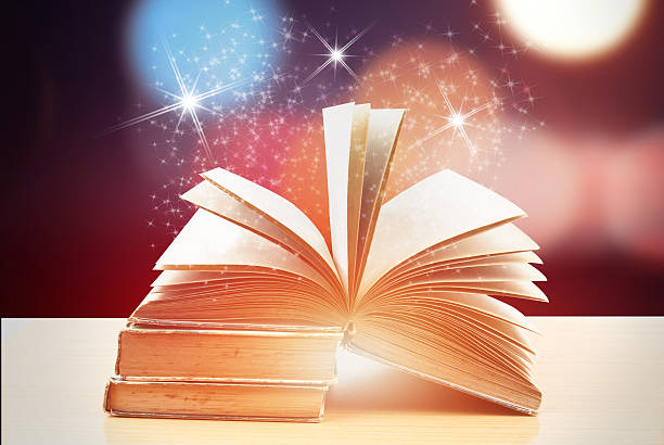 istock Abstract magic book on wooden background 519681862