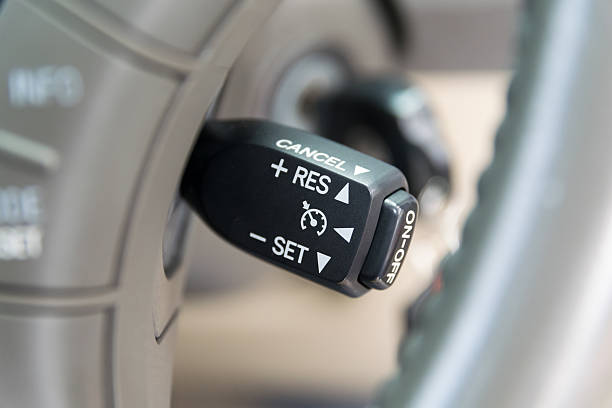 istock Cruise control buttons on modern car and speed limitation 519682094