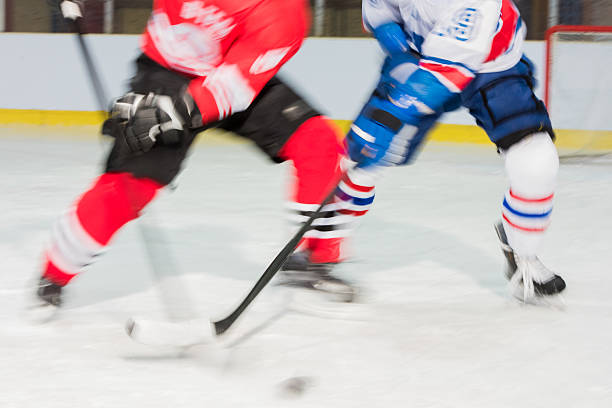 istock Men playing ice hockey 519682166