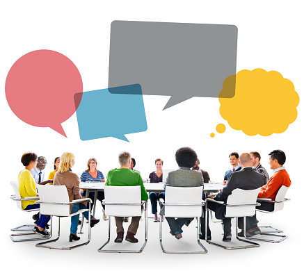 Group of People in Meeting with Speech Bubbles