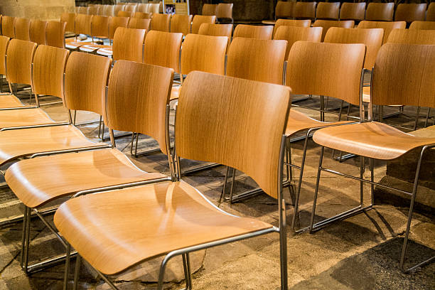 istock Group of chairs with no people inside a church 519683633