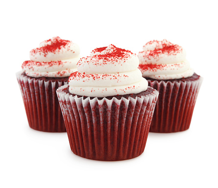 Red Velvet cupcakes isolated on white (selective focus)