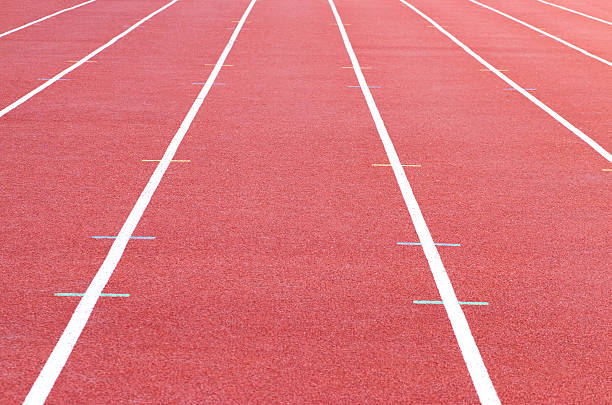 istock track running, Red treadmill in sport field. soft focus 519684338