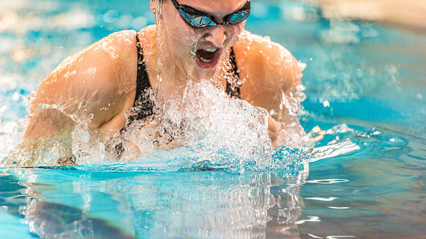 istock Female swimmer swimming 519684418