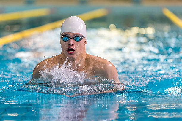 istock Male swimmer swimming 519684524