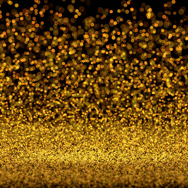 istock gold glitter and bokeh background 519684525