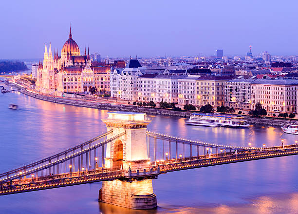 istock a bridge over a river crossing into the city 519684757