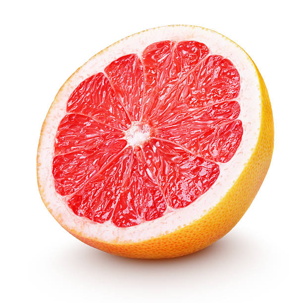 Half grapefruit citrus fruit isolated on white Half grapefruit citrus fruit isolated on white with clipping path grapefruit photos stock pictures, royalty-free photos & images