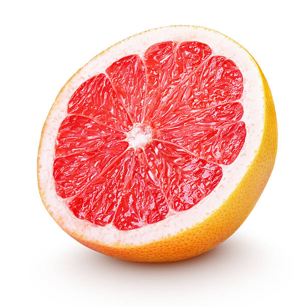 половина грейпфрут цитрусовый плод изолирован на белом - grapefruit fruit freshness pink стоковые фото и изображения