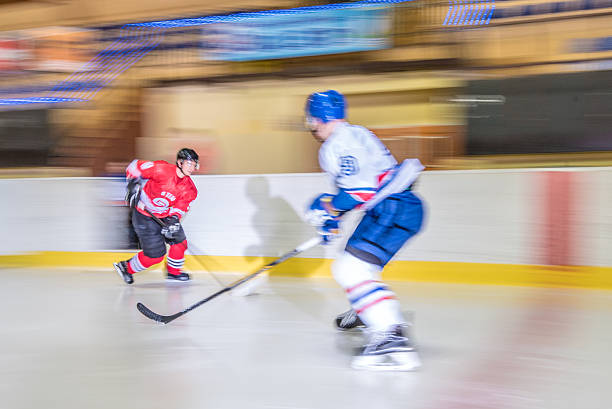 istock Men playing ice hockey 519685060