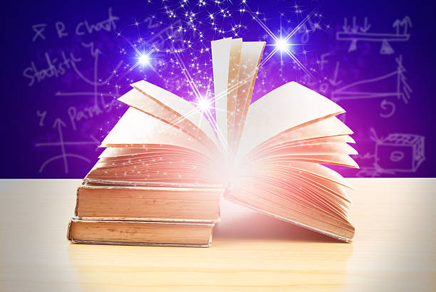 istock Abstract magic book on wooden background 519685192