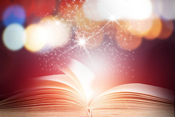 istock Abstract magic book on wooden background 519685228