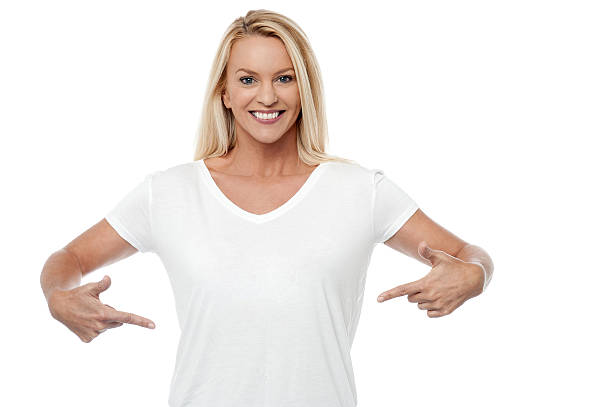 istock Smiling woman pointing her stomach 519685421