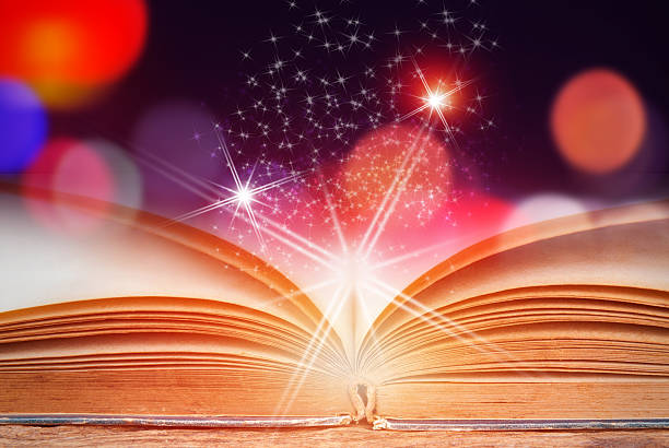 istock Abstract magic book on wooden background 519686602