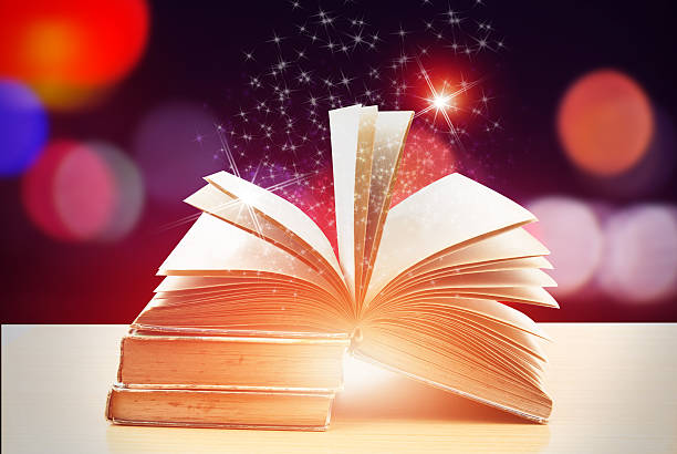 istock Abstract magic book on wooden background 519686634