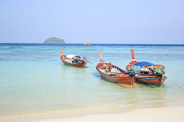 istock Longtail boat for visit beautiful beach of Koh Lipe, Thailand 519687103