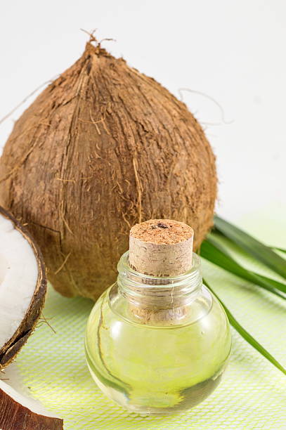 istock Coconut oil in a bottle 519687190