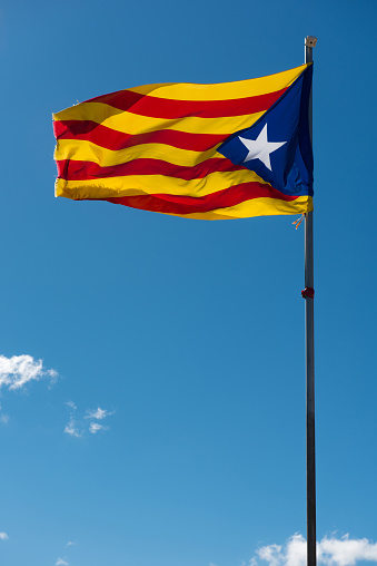 Agitando bandera de cataluña photo