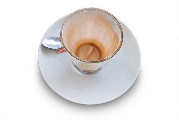 istock Empty glass cup of coffee latte on wooden table. 519688208