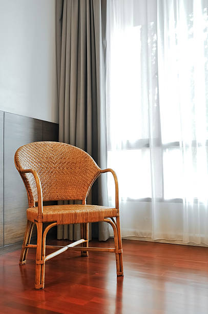 istock chair in living Wicker room 519688523