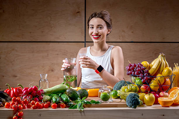 istock Sport woman drinking water at the kitchen 519690988