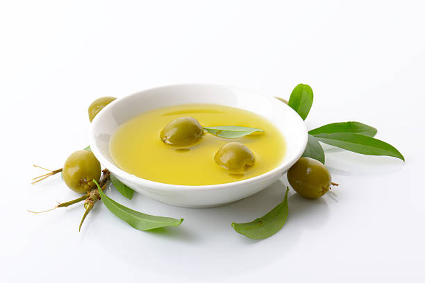 istock Pitted green olives and oil 519691138