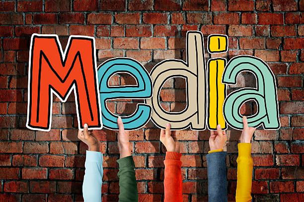 istock Group of Diverse People's Hands Holding Media 519701869