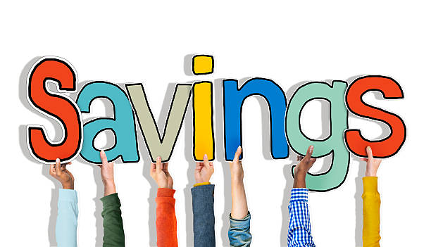 istock Diverse People's Hands Holding Word Savings 519701883